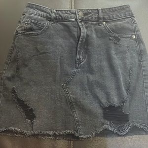 a black jean skirt (lightly used)